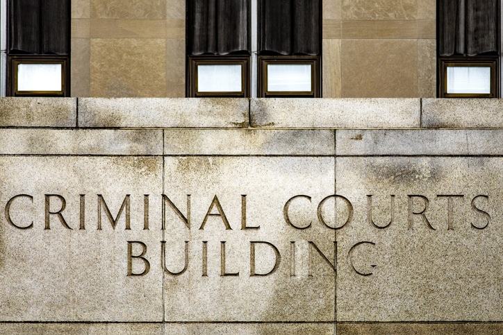 New York criminal courtroom during firearm-related proceedings