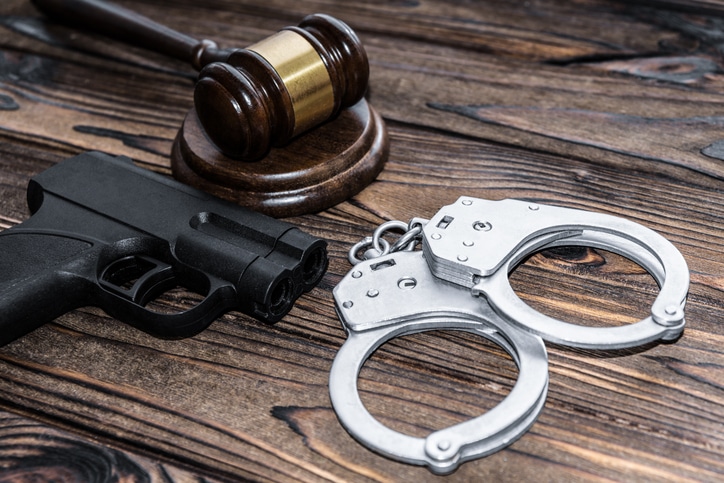 New York attorney reviewing firearm and immigration case documents