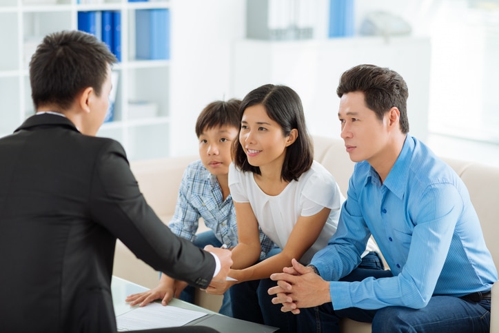 Couple meeting with an attorney for legal advice
